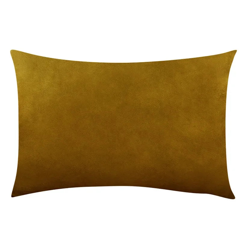 A square velvet throw pillow cover in a rich golden brown or mustard color.