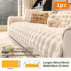 A beige plush anti-slip sofa cushion with decorative fluff and a yellow accent shown on a sofa.