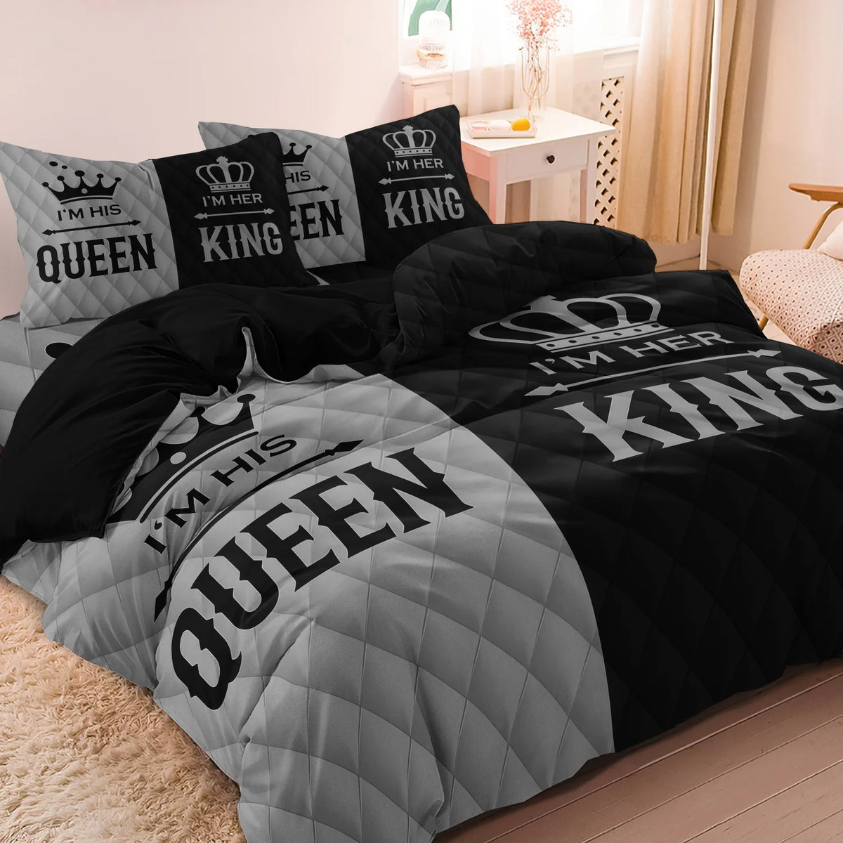 A black and gray couple duvet set featuring crown print bedding with I'm his and I'm her text.