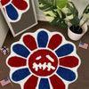 A red, white, and blue sunflower patterned absorbent non-slip bathroom mat.