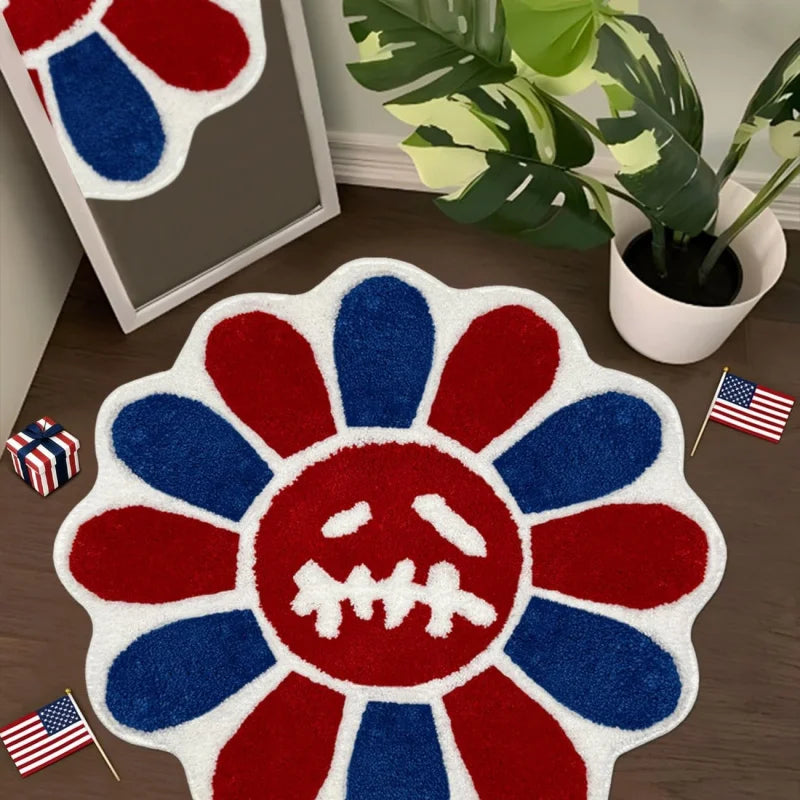 A red, white, and blue sunflower patterned absorbent non-slip bathroom mat.