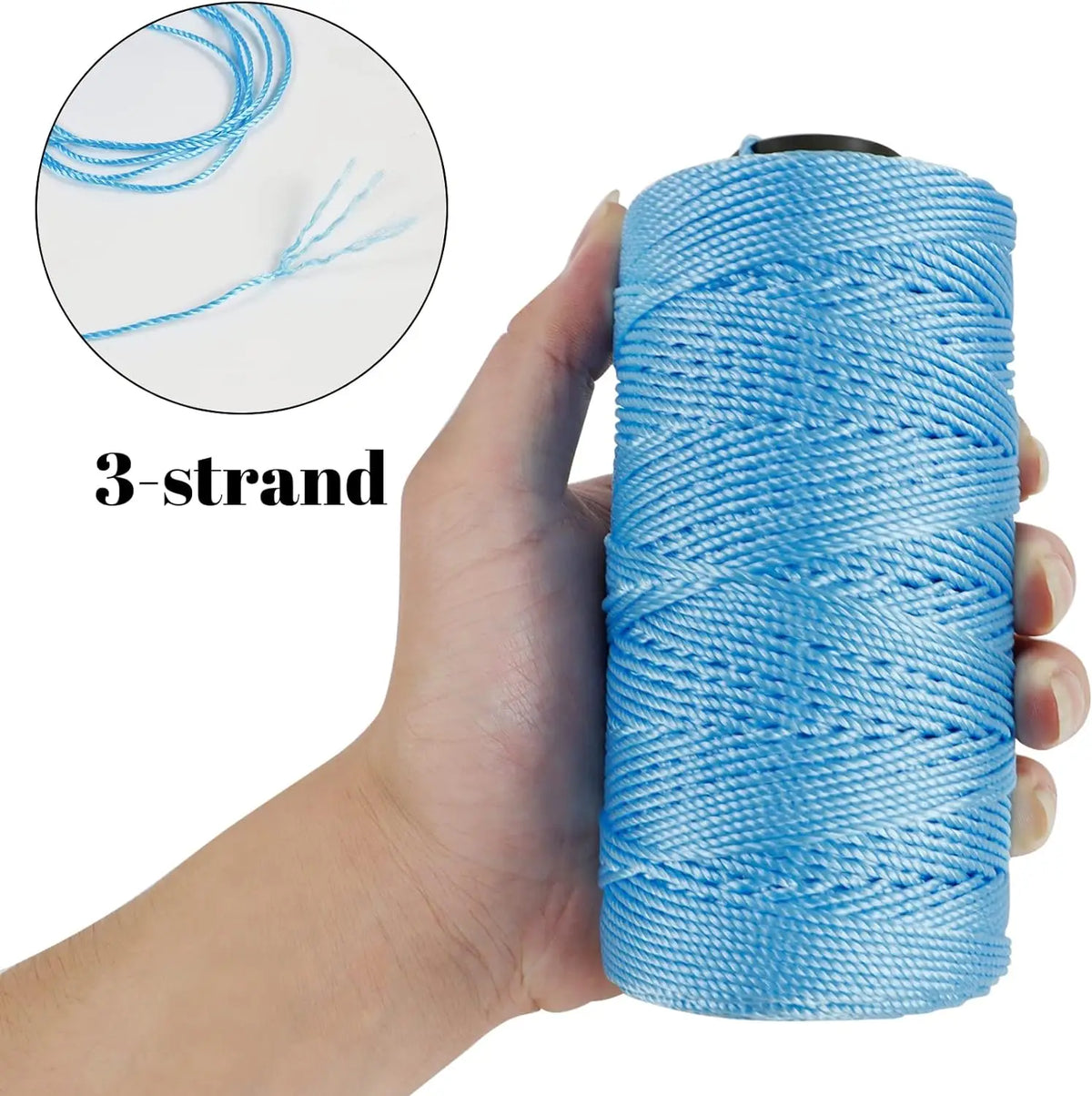 A hand holds a spool of blue 3-strand ice silk crochet yarn for crafting.