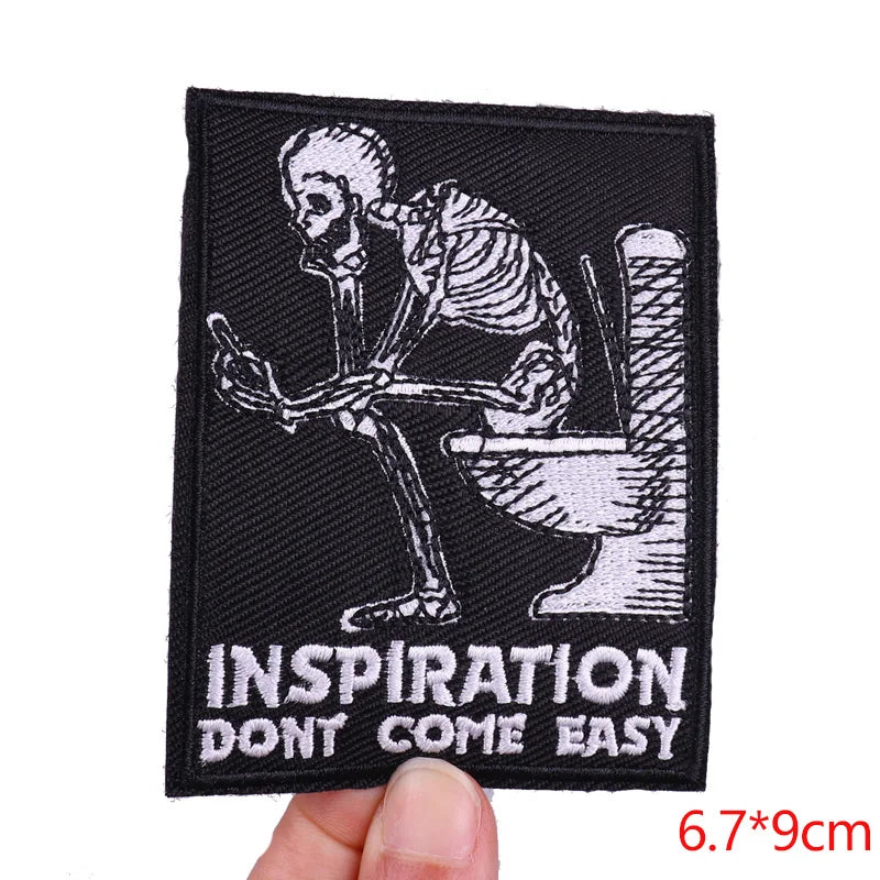 Black embroidery patch featuring a skeletal skull and toilet design for clothing