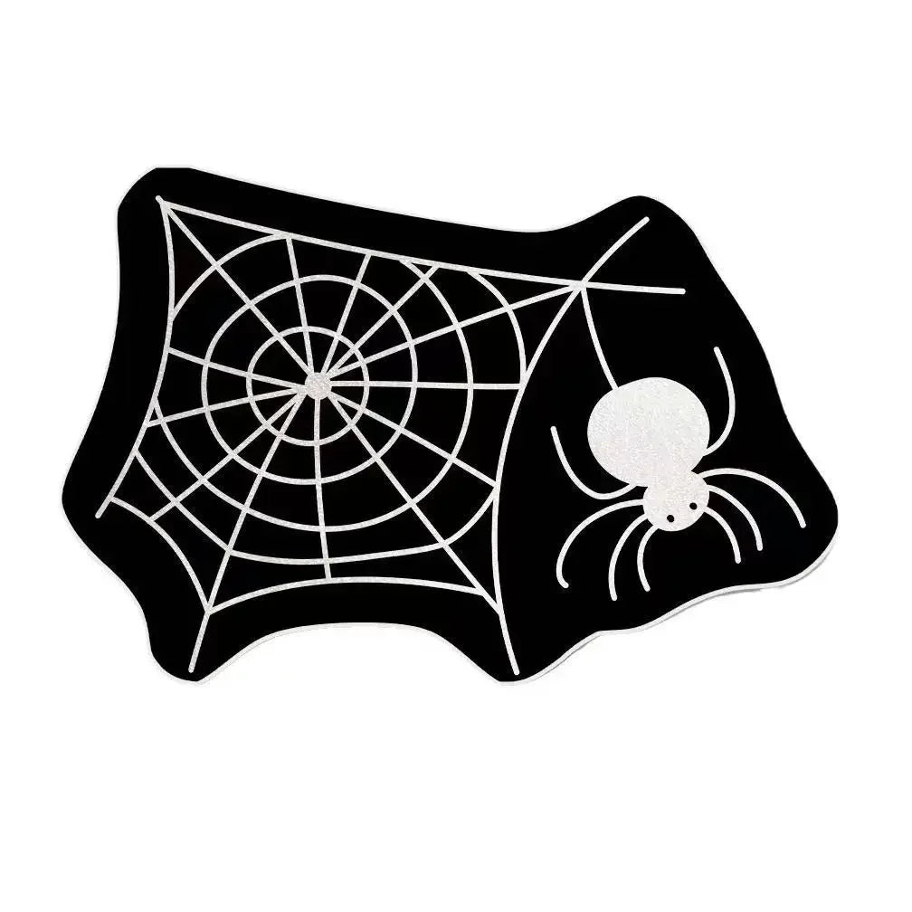 Black spider web design on a mat for a Halloween door mat