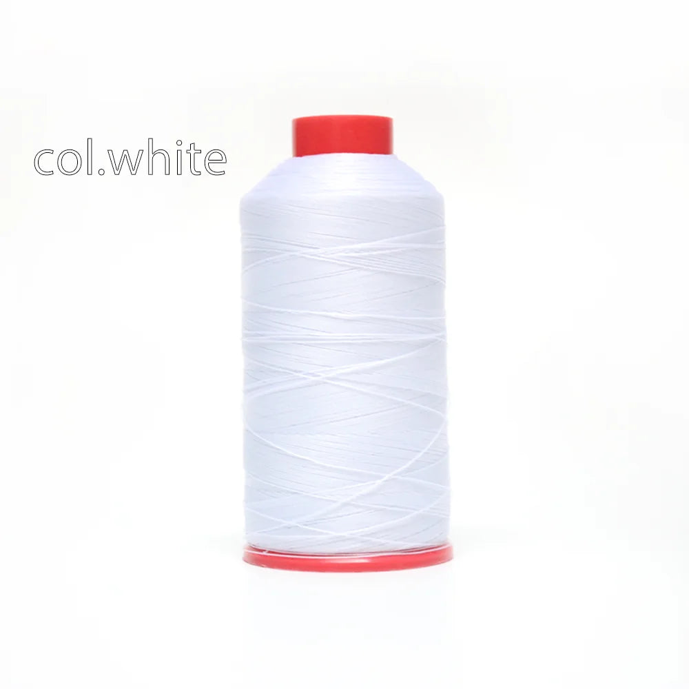 A spool of white heavy duty nylon sewing thread with a red cap.