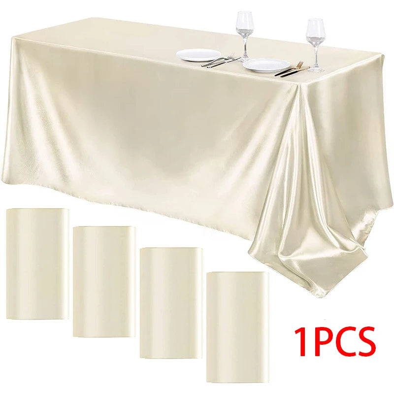 Luxury rectangle satin tablecloth set with matching cylindrical candle holders and silverware