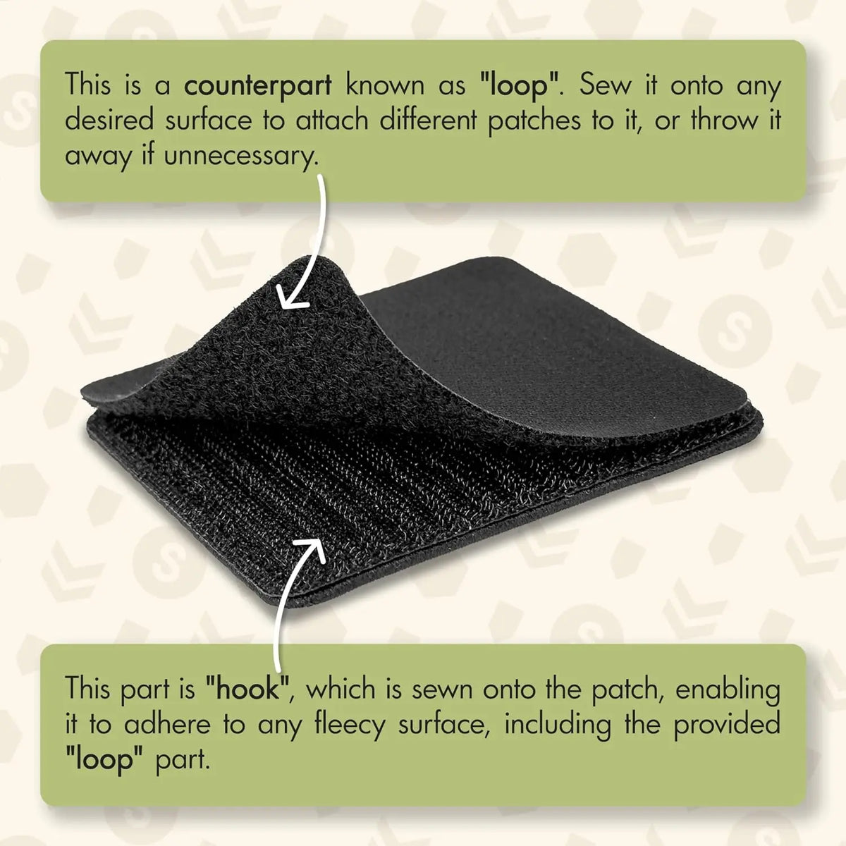 A black tactical patch showing a hook sewn onto it, which is used to attach different patches or loops.