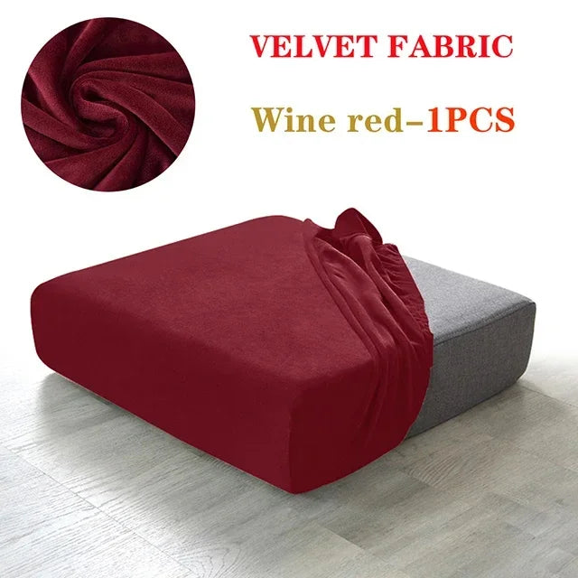 A deep wine red velvet fabric sofa seat cover displayed on a gray cushion.