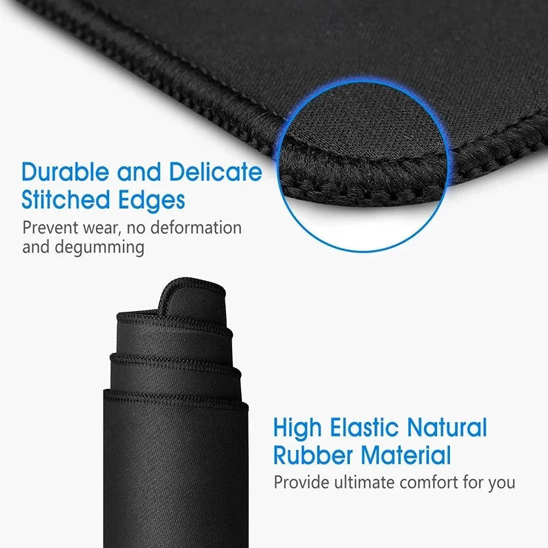 Close-up view of a black mouse pad showing durable stitched edges and high elastic natural rubber material