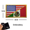 Embroidery of the Mexican flag featuring the eagle and serpent design on a fabric patch.