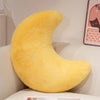 A bright yellow moon-shaped throw pillow with a fluffy texture.