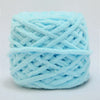 A ball of light blue soft chenille knitting yarn for hand crafting