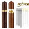 A set of stainless steel sewing needles and a gold-colored cylindrical container for storage.