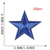 A blue five-pointed star embroidery patch shown against a measurement scale.