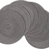 A stack of six round, gray braided placemats for dining and party decor.