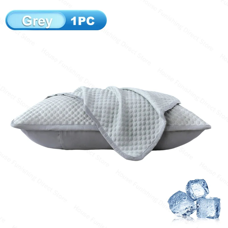Grey ice silk cooling pillowcase shown flat with ice cubes nearby