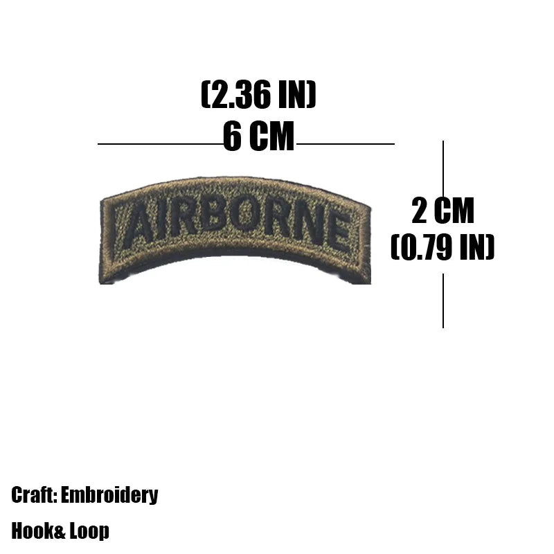 An embroidered tactical patch with the word AIRBORNE, measuring 2.36 inches by 6 cm.