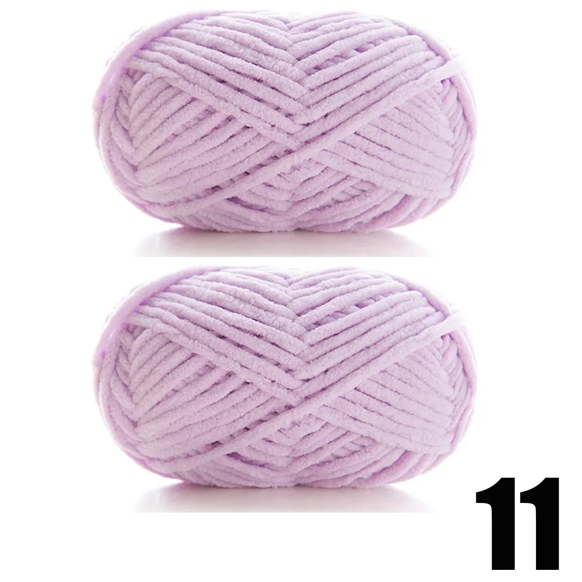 A ball of thick, light purple velvet yarn used for knitting and crochet projects.