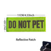 Lime green reflective patch embroidered with the text DO NOT PET