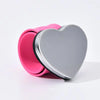 A pink magnetic wrist pincushion with a silver heart-shaped silicone band.
