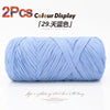 Two skeins of light blue elastic yarn used for crafting