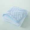 Light blue fleece swaddle blanket with a quilted texture folded on a light gray surface.