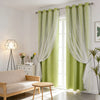Light green and white double-layer decorative curtains hanging in a bright room.