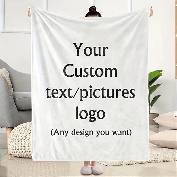 A white fabric blanket displayed hanging, ready for custom text or pictures to be added.
