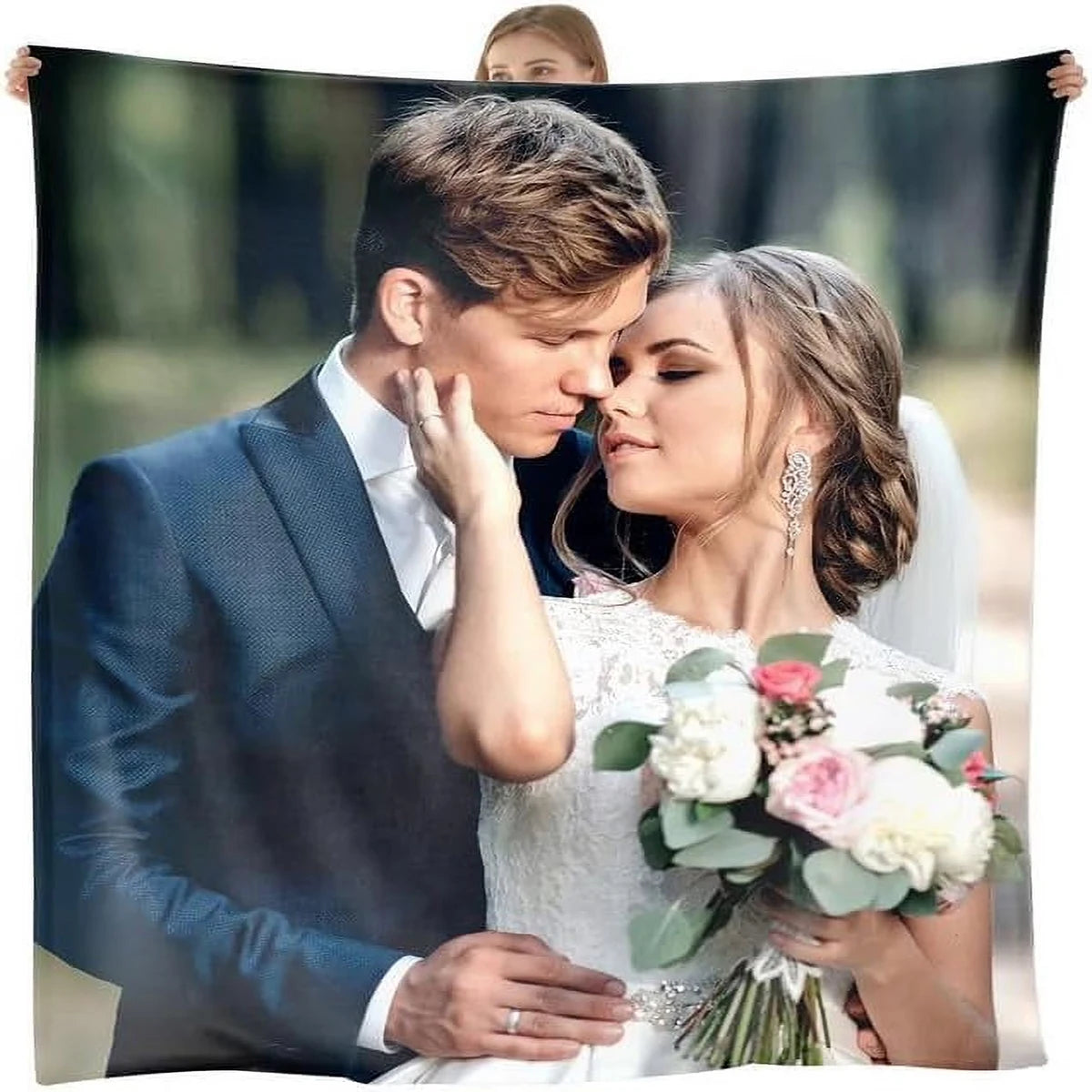 A bride and groom embracing in a portrait photo, featuring soft lighting and natural outdoor scenery.