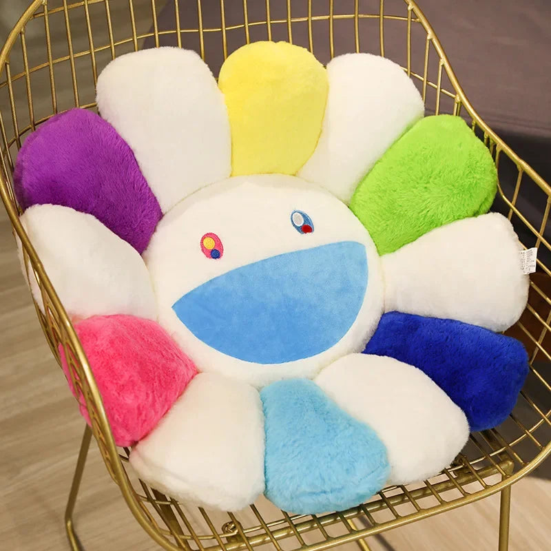 A collection of fluffy plush cushions in various colors including purple yellow green and white arranged in a gold wire baske