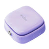 A small, lavender-colored magnetic sewing kit with a rounded square shape.