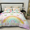 A pink and multicolored rainbow themed quilt cover set featuring butterfly patterns on a bed.
