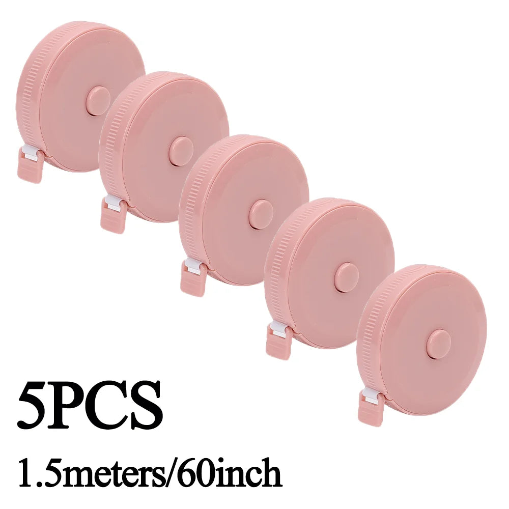 Five pink retractable double-sided measurement tapes, 1.5 meters long.
