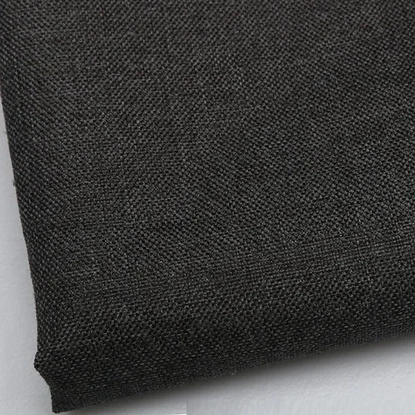A close-up view of coarse black linen and cotton fabric texture.