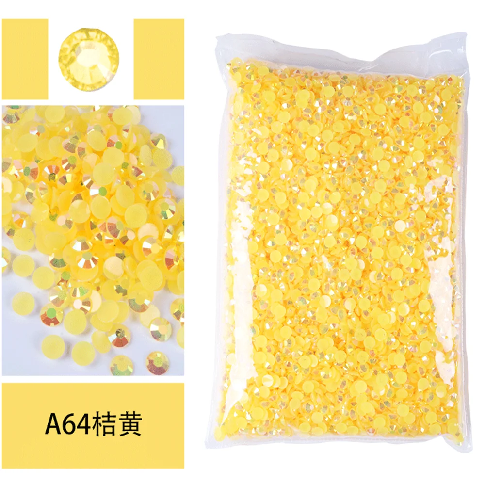 Bag of yellow resin rhinestones ranging from 2mm to 6mm in size.