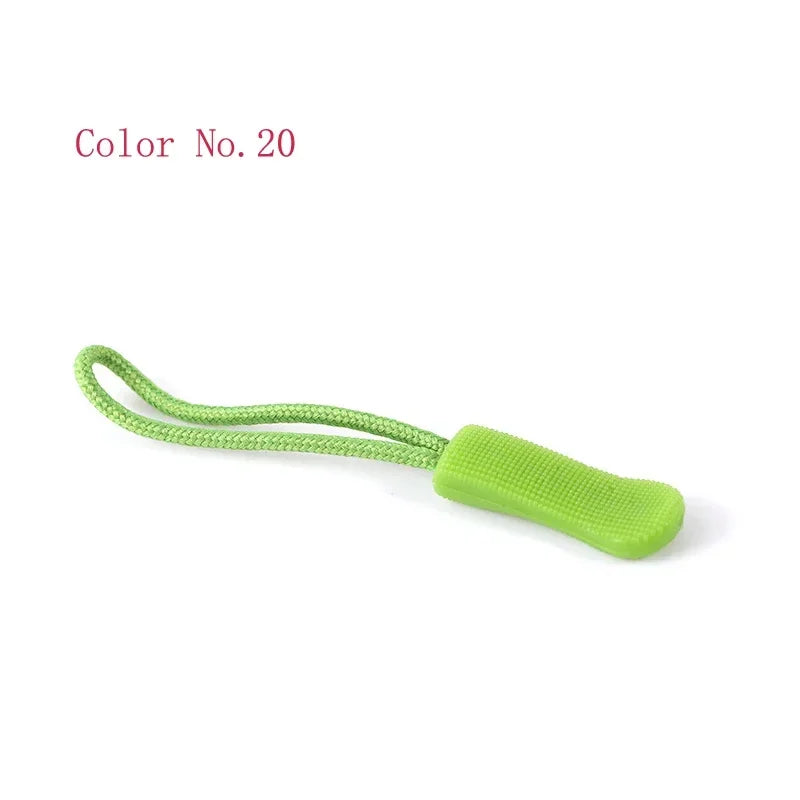 A bright lime green replacement zipper pull for bags and apparel.