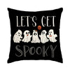 Black pillow cover featuring a graphic of several ghost figures with Halloween theme