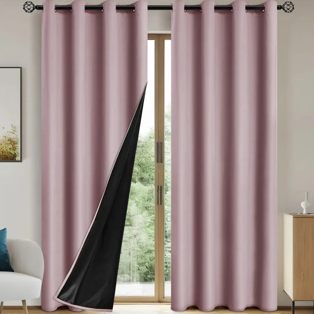 A pair of floor-length mauve blackout curtains hanging in a doorway.