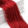 A close-up of a long, vibrant red thread curtain tie-back for doors and windows.
