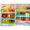 Set of four colorful non-slip silicone mats used as refrigerator and freezer shelf liners