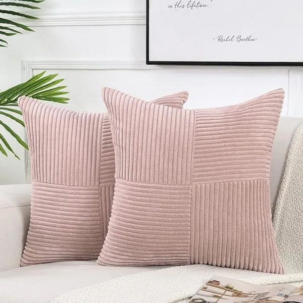 Pink corduroy patchwork pillow covers with vertical ribbing and square stitching