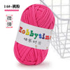 A ball of bright pink thick polyester craft yarn labeled Hobbytime for knitting and crochet