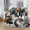 A throw blanket featuring characters from Jujutsu Kaisen anime in various poses and colors.