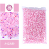 Bag of pink glitter and rhinestones for decoration