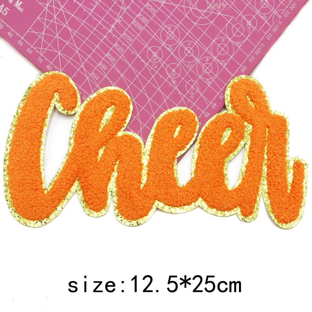 Orange felt cheer letter iron-on patch with gold glitter outline