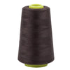 A roll of dark brown sewing thread with a light green cap.