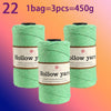 Three spools of green Hollow yarn, each containing 3 pieces and weighing 450g total.