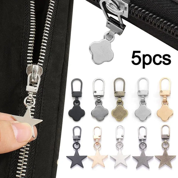 A close-up view of a black zipper with multiple metal zipper pull replacements, including a star shape, shown next to five in