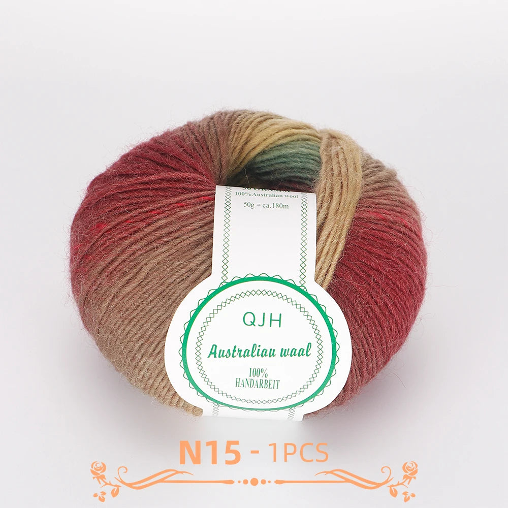 A ball of multi-colored wool yarn with shades of red, brown, and green.
