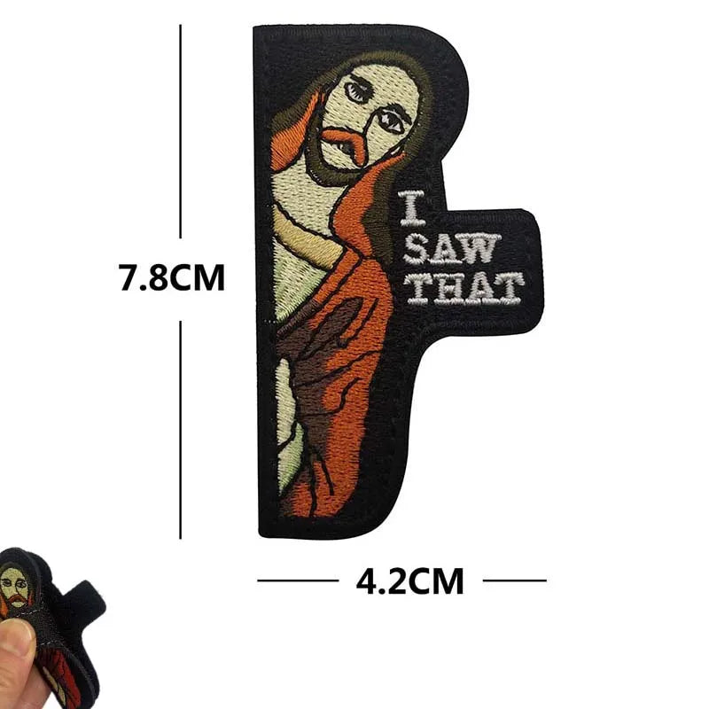 An embroidered patch featuring a depiction of Jesus with text that reads I SAW THAT